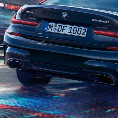 BMW Série 3 Berline, embouts d'échappement. Détail de la poupe de la BMW Série 3 Berline avec embouts d'échappement M spéciaux en Ceriumgrau metallic.