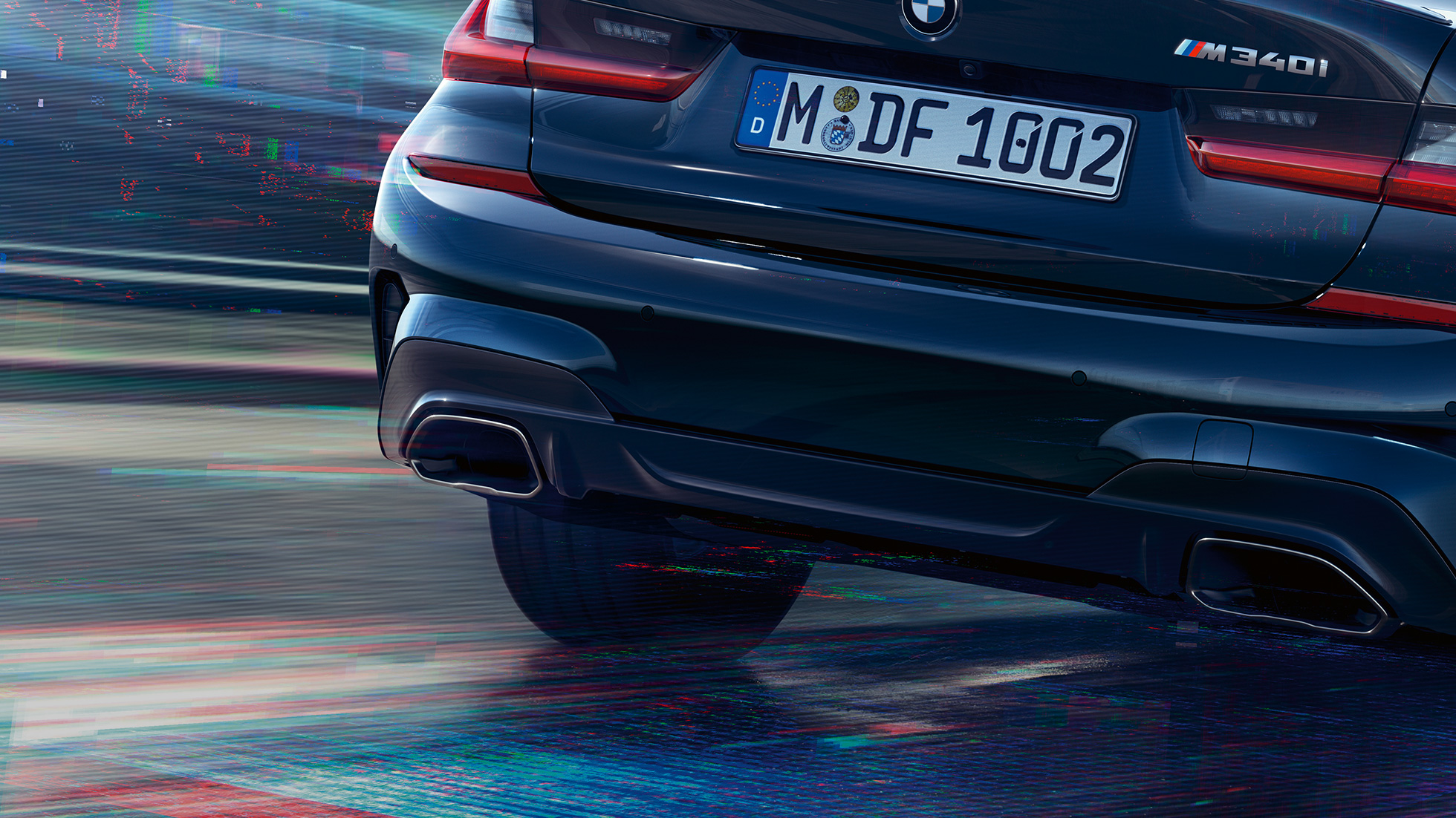 BMW Série 3 Berline, embouts d'échappement. Détail de la poupe de la BMW Série 3 Berline avec embouts d'échappement M spéciaux en Ceriumgrau metallic.