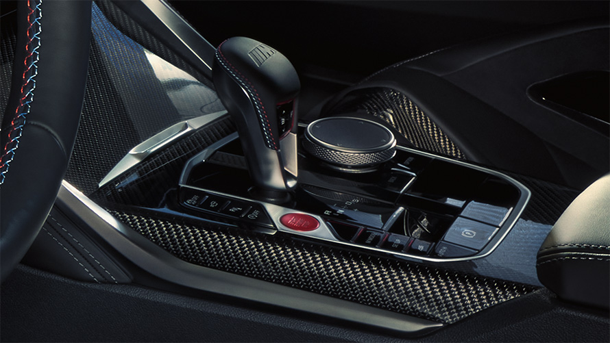 BMW M3 Competition Touring G81 avec boîte de vitesses M Steptronic à 8 rapports avec Drivelogic dans la console centrale, vue en gros plan